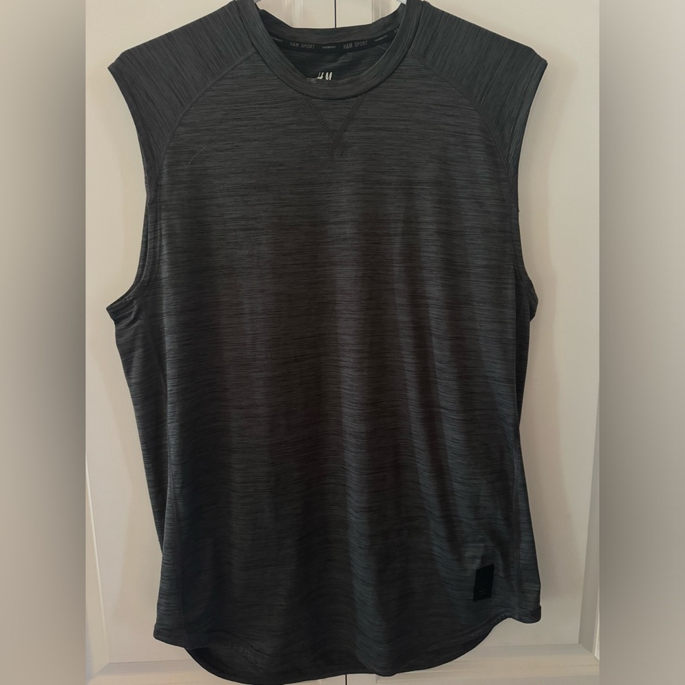 Grey HM sleeveless dry sport shirt, size men’s medium